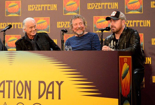 Led Zeppelin's Jimmy Page, Robert Plant, and Jason Bonham (son of late drummer John Bonham) have a laugh during a press conference to launch the release of "Celebration Day." The Museum of Modern Art, New York, October 9, 2012.